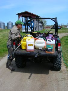 preparing to spray a food plot